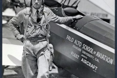 Pilot and airplane marked Palo Alto School of Aviation